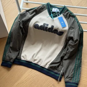 AAA Super Clone Adidas Long-Sleeved Green Woven Fabric Color Blocking
