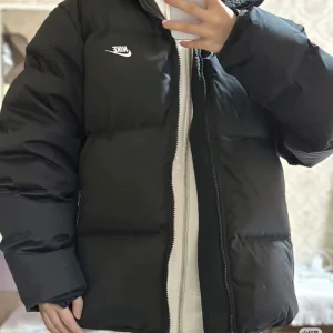 Super Clone Nike Down Jacket Red Duck Polyester Fiber High Cost Performance Autumn Winter And Three-Proof Fabric